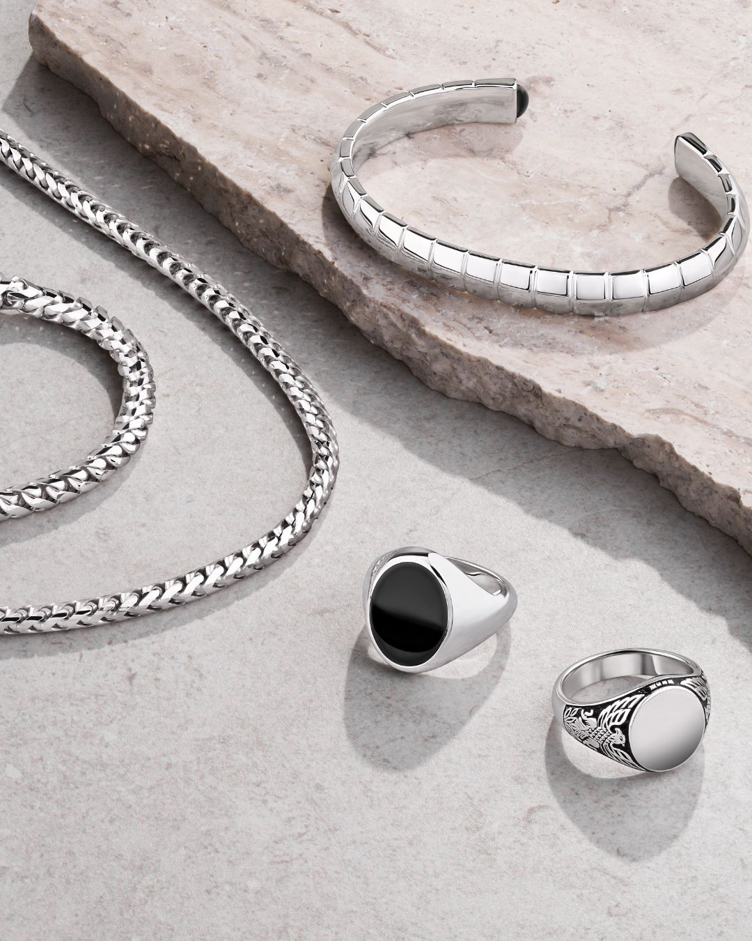 House of Argent sterling silver jewelry on marble